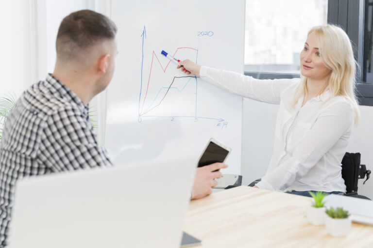 woman-wheelchair-giving-presentation-work